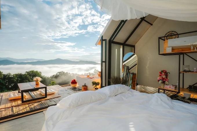 Cozy living room with a modern fireplace and comfortable sofa.